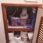 Bathroom cupboard under sink. Yes it's a bit messy but it's OK not to be prefect!