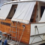 Transom in berth from starboard side showing glimpse of aft deck