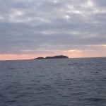 Sunrise behind South Solitary Island