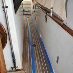 Oiling a section at a time and taped deck where we DON'T want the oil to go