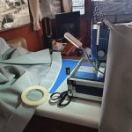 My work bench. I also use double-sided tape to hold the fabric together.