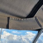 Tabs with Velcro to strengthen the zipper stops