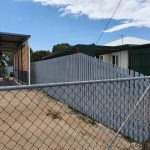 First coat to dividing fence