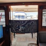 Door cover can be opened to improve airflow and keep the cats in